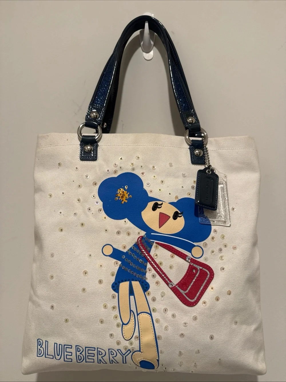Coach Cream Canvas Tote with Blueberry Print & Navy Handles